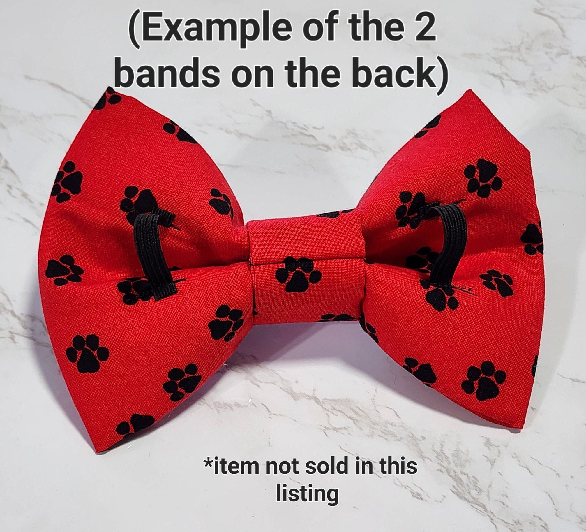Red Dog Bow Tie With White Paws and Bones