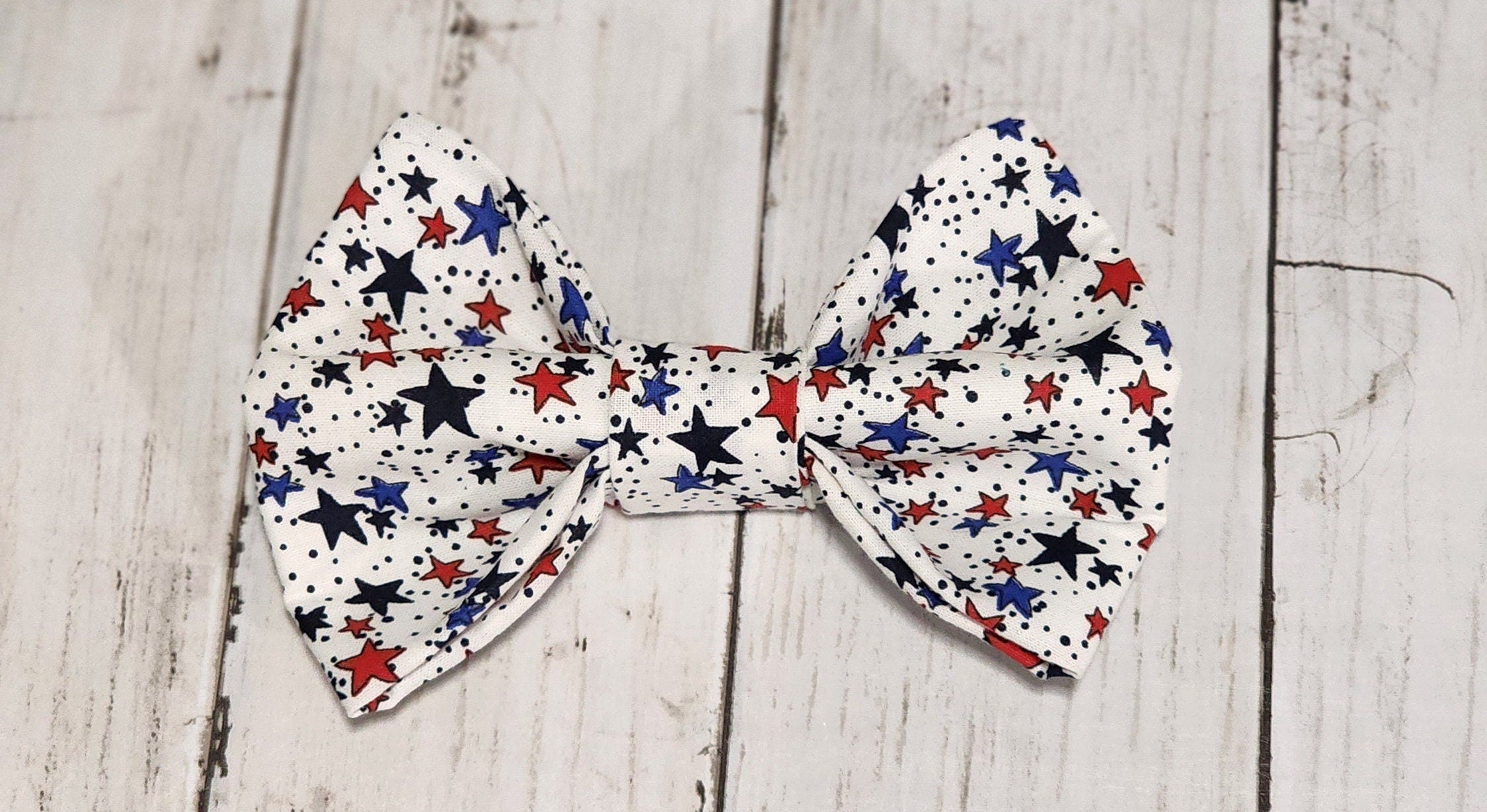 White Dog Bow Tie With Red And Blue Stars