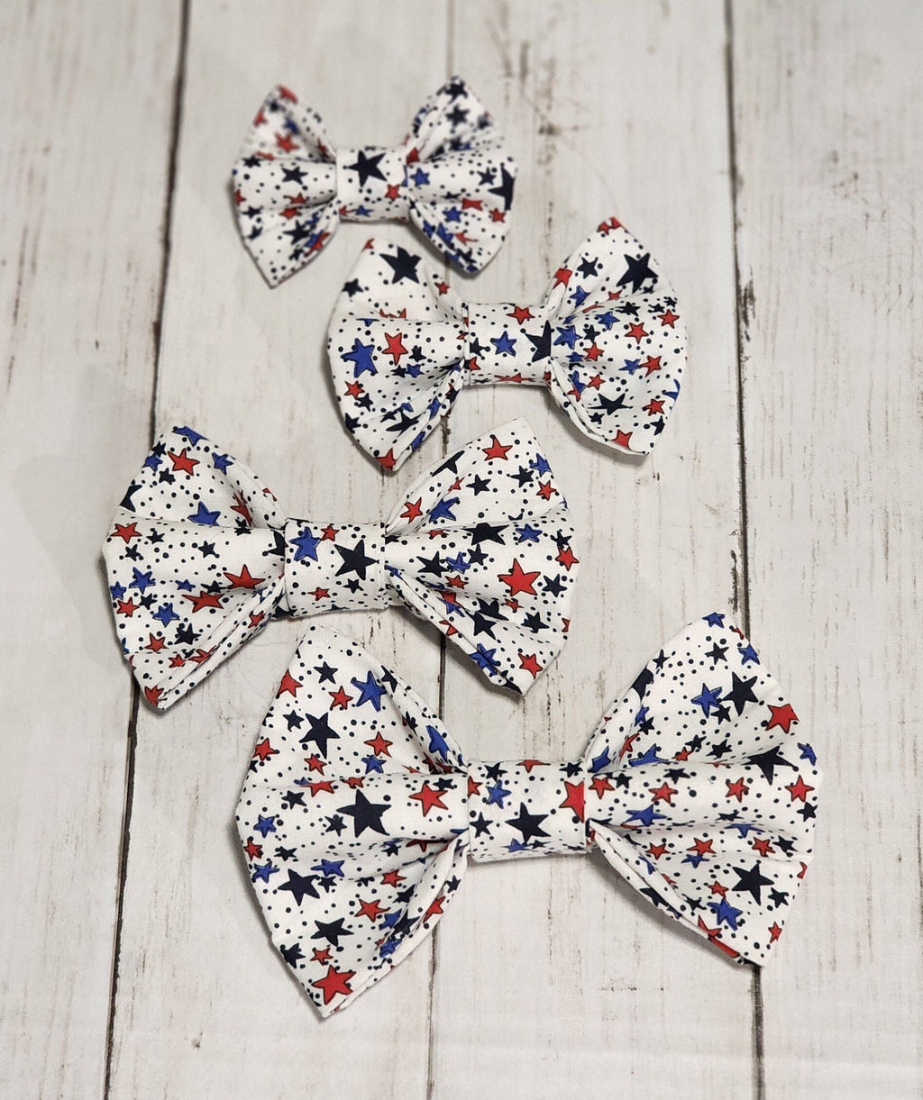 White Dog Bow Tie With Red And Blue Stars
