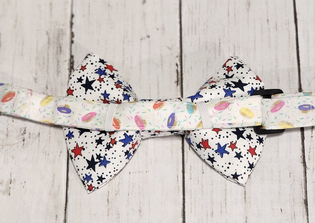 White Dog Bow Tie With Red And Blue Stars